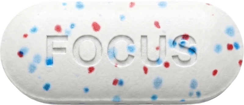 Retabolic Focus tablet, white with red and blue specks, stamped FOCUS